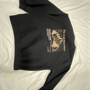 Black Crew Neck Sweater with Golden Graphic